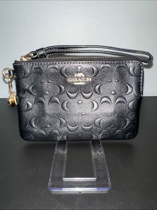 Coach Handbags - Coach Black Embossed Signature Wristlet with Gold Accent & Charm. Perfect
